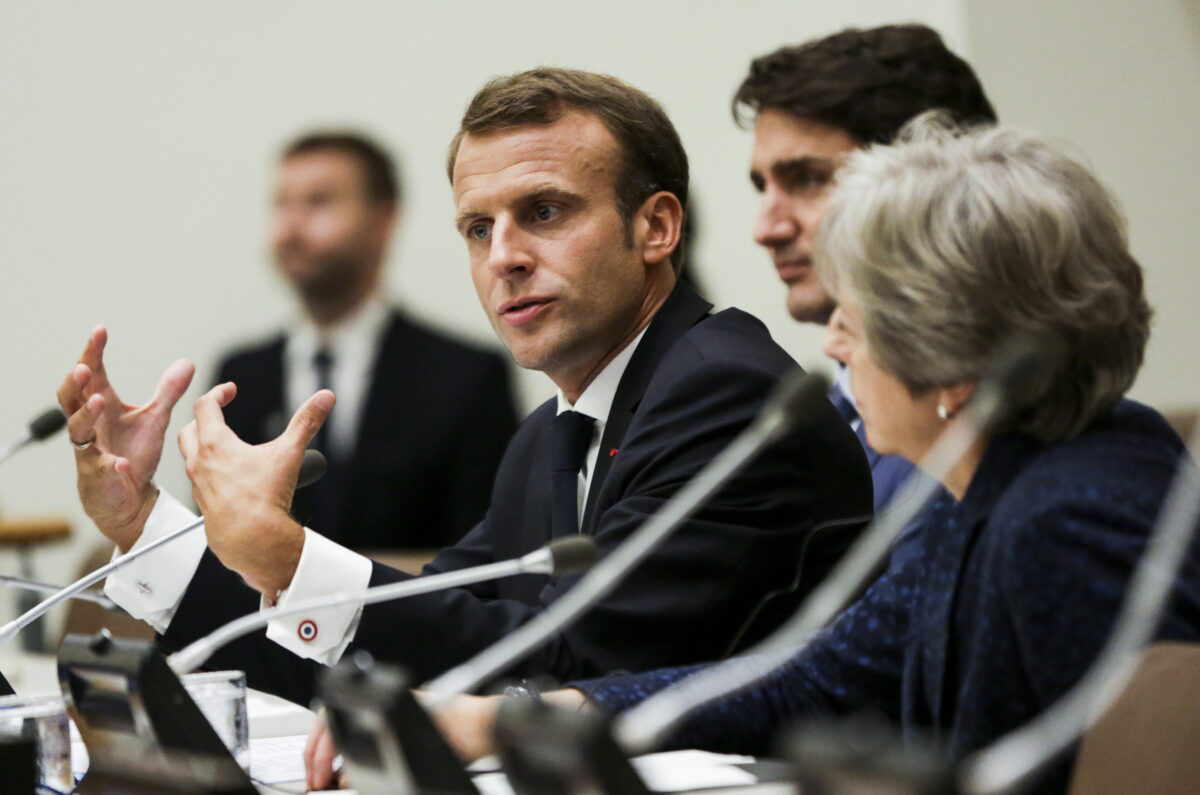 epa07047136 French President Emmanuel Macron (L) sits with Canadian Prime Minister Justin Trudeau (2-R) and British Prime Minister Theresa May (R) during an event called '12 Years to Break Barriers and Leave No Girl Behind: Countdown to 2030' on the sidelines of the the General Debate of the General Assembly of the United Nations at United Nations Headquarters in New York, New York, USA, 25 September 2018. The General Debate of the 73rd session begins on 25 September 2018. EPA/AMR ALFIKY / POOL